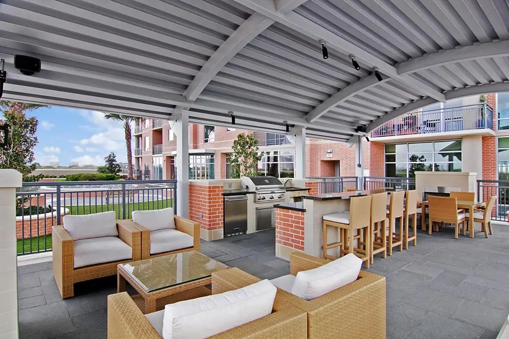 Highland Tower outdoor kitchen and lounge area with covered seating